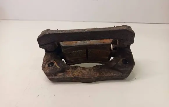 Nissan Pathfinder R51 Brake caliper pad carrier rear 