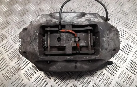 Volkswagen Touareg II Front brake caliper 