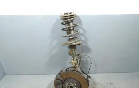 Toyota Avensis T220 Front shock absorber with coil spring 
