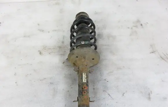 Volkswagen Golf IV Front shock absorber with coil spring 1J0413031T