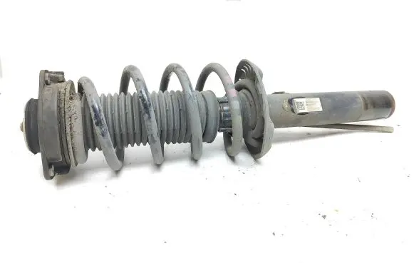 Audi Q3 8U Front shock absorber with coil spring 5N0413031AF