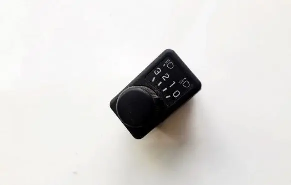 Nissan Primera Headlight level height control switch