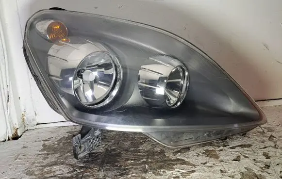 Opel Zafira B Headlight/headlamp 24451053 0301214202 39340508