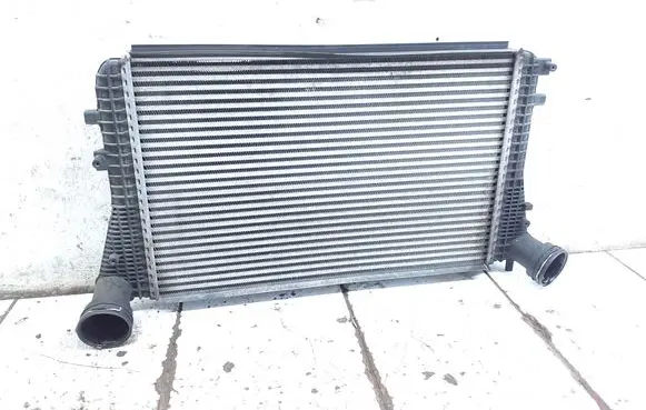 Volkswagen Golf V Intercooler radiator 1K0145803T