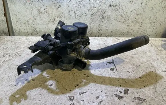 Coolant heater control valve