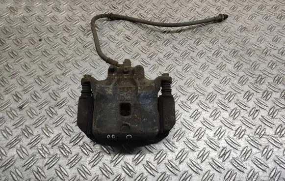 Nissan Juke I F15 Front brake caliper 