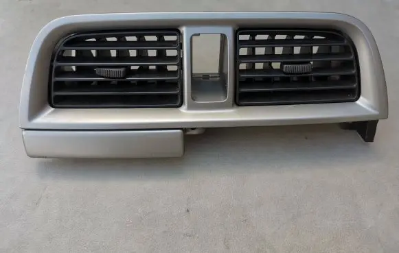 Subaru Impreza II Dash center air vent grill E5615161100 S16405830