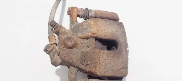 Suzuki Swift I Front brake caliper