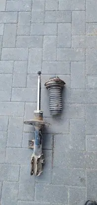 KIA Sportage Front shock absorber/damper 546513U000