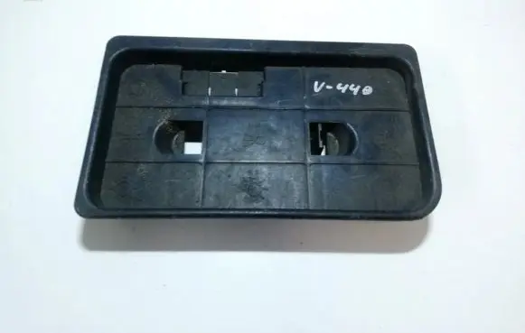 Tail light bulb cover holder