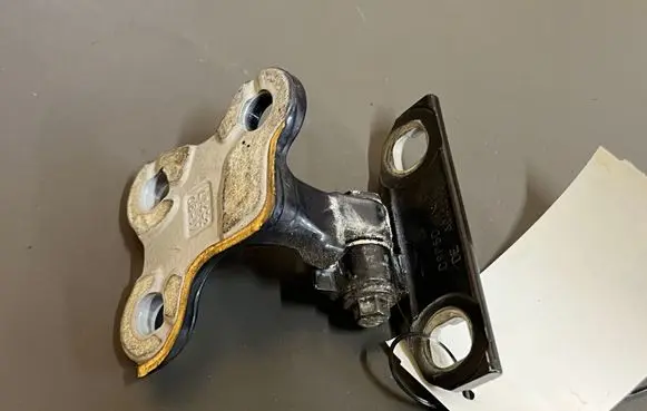 Front door lower hinge