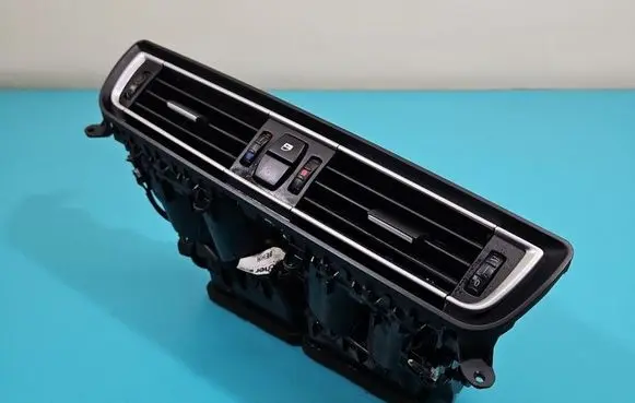 Dash center air vent grill