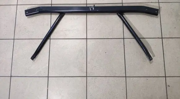 Top upper radiator support slam panel