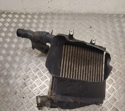 Volkswagen Touareg I Intercooler radiator 7L0117339