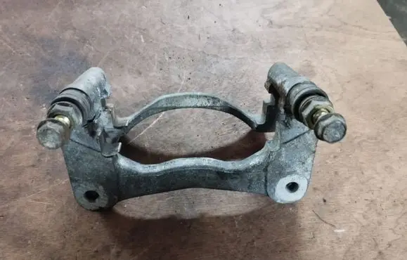 Mitsubishi Endeavor Front Brake Caliper Pad/Carrier 
