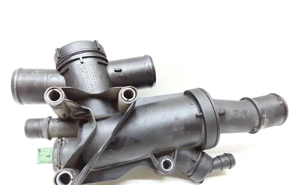Thermostat/thermostat housing
