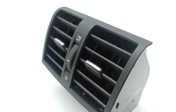 Volkswagen Caddy Dash center air vent grill 1T0819203B
