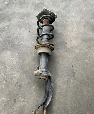 Front shock absorber with coil spring