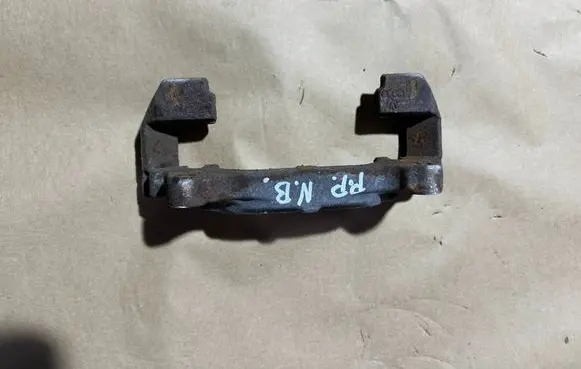 Volkswagen New Beetle Front Brake Caliper Pad/Carrier 
