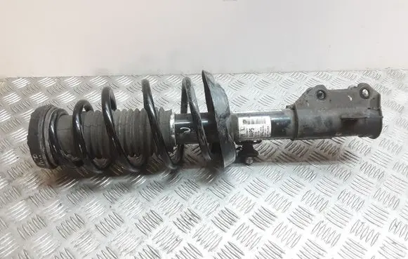 Opel Astra J Front shock absorber with coil spring 13333977