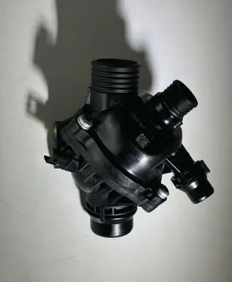 Thermostat/thermostat housing