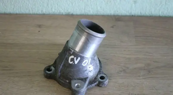 Thermostat/thermostat housing