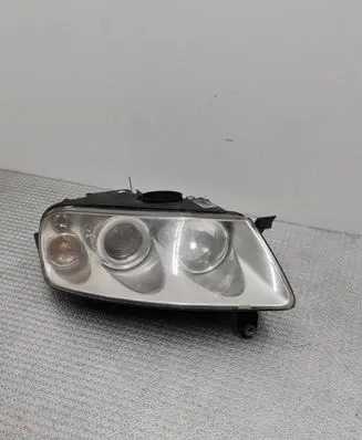 Volkswagen Touareg I Headlight/headlamp 7L6941016CE 89307881