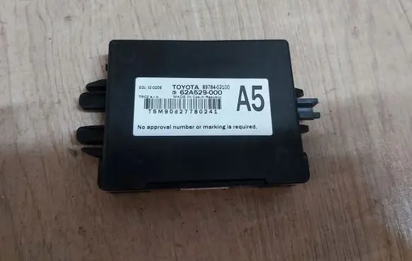 Toyota Corolla E210 E21 Trunk lid opening control unit 89784-02100