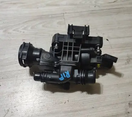 Thermostat/thermostat housing
