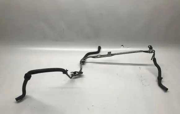 Volkswagen Golf VII Engine coolant pipe/hose 06J121075D