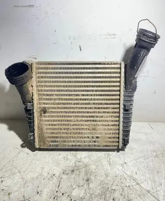 Volkswagen Touareg I Intercooler radiator 7L0121253A