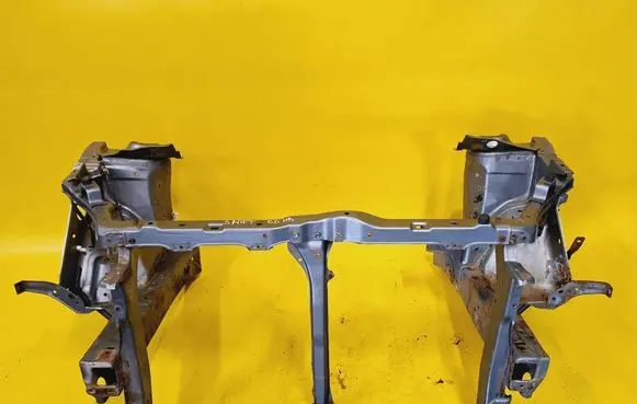 Radiator support slam panel