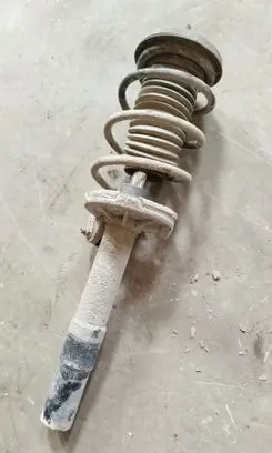 Front shock absorber with coil spring