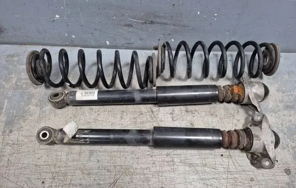 Volkswagen PASSAT B7 Rear shock absorber with coil spring 