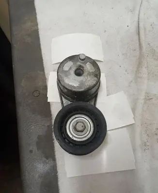 Chrysler Pacifica Generator/alternator belt tensioner 04627533AC