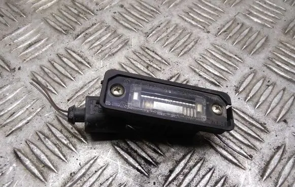 Volkswagen PASSAT B6 Number plate light 1J6943021B