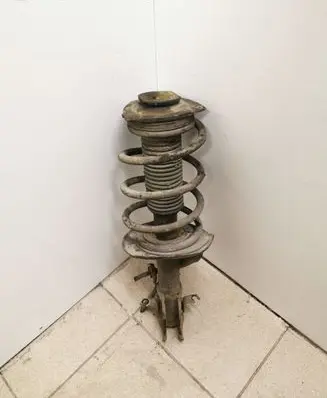 Nissan Leaf I (ZE0) Front shock absorber with coil spring 543211KA0B