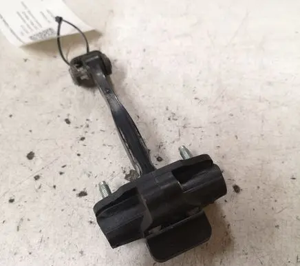 Rear door check strap stopper