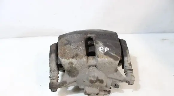 Volkswagen Golf VII Front brake caliper