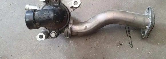 Thermostat/thermostat housing