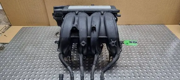 Volkswagen Golf V Intake manifold 06A133203EM JNV130125D