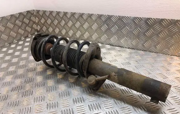 Volkswagen Jetta V Front shock absorber with coil spring