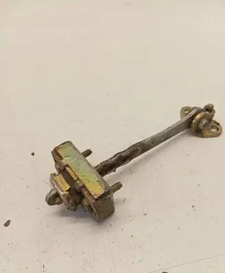 Front door check strap stopper