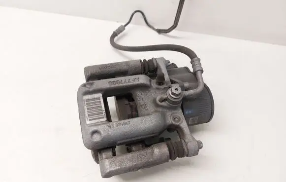 Opel Astra L Rear brake caliper 9819059380