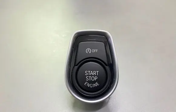 Engine start stop button switch