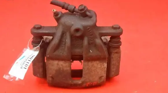 Nissan Note (E11) Front brake caliper