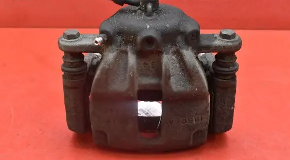 Nissan Micra C+C Front brake caliper
