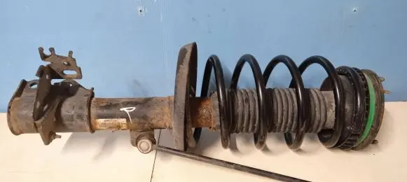 Front shock absorber with coil spring