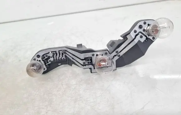 Toyota Avensis T250 Tail light bulb cover holder