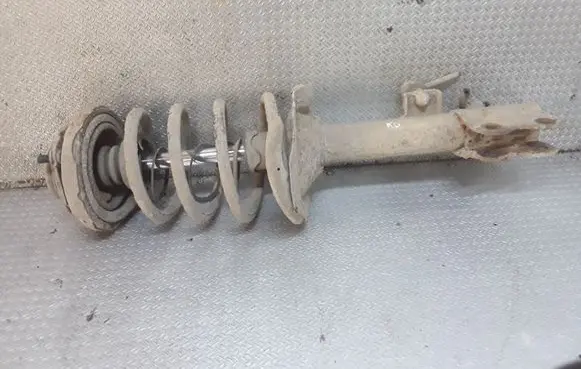 Nissan X-Trail T30 Rear shock absorber with coil spring 